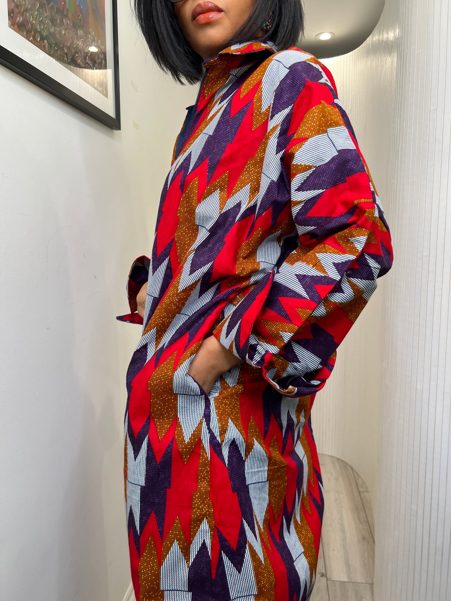 African print long sleeve jumpsuit. Red and navy kente UK size 1 8-14/16