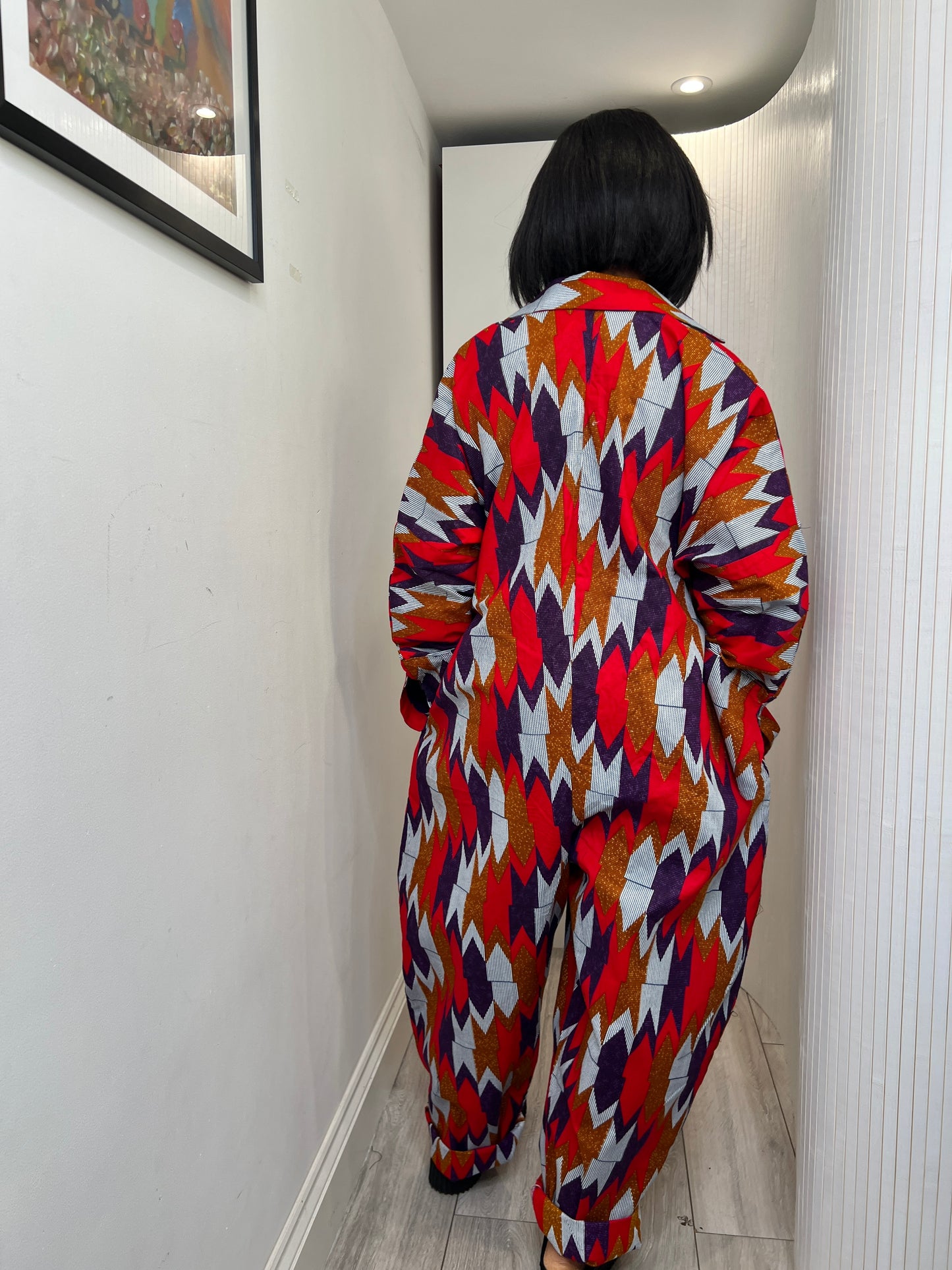 African print long sleeve jumpsuit. Red and navy kente UK size 1 8-14/16