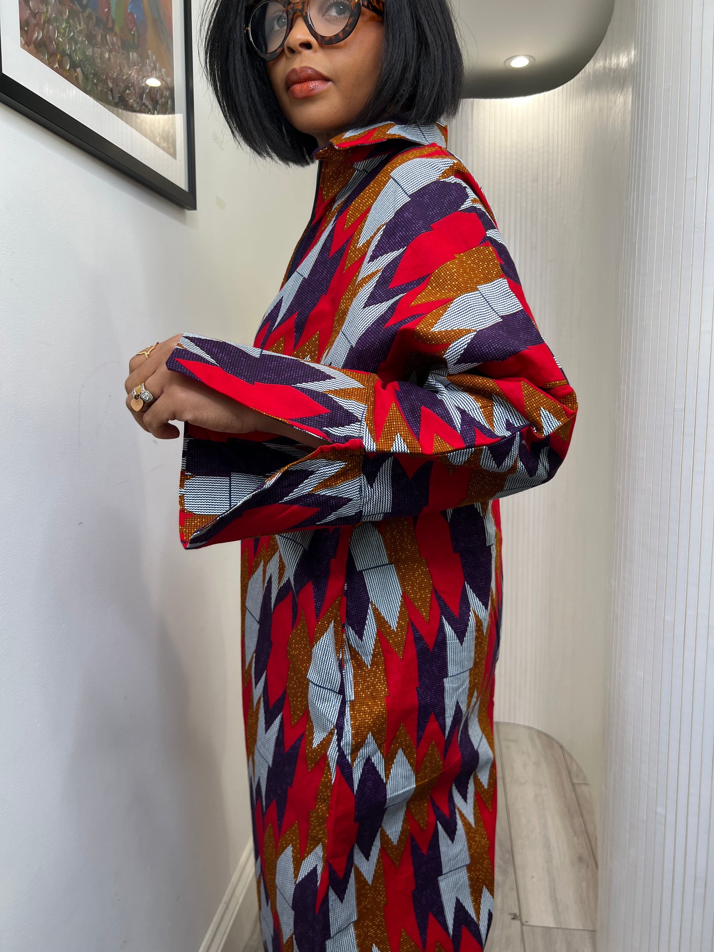 African print long sleeve jumpsuit. Red and navy kente UK size 1 8-14/16