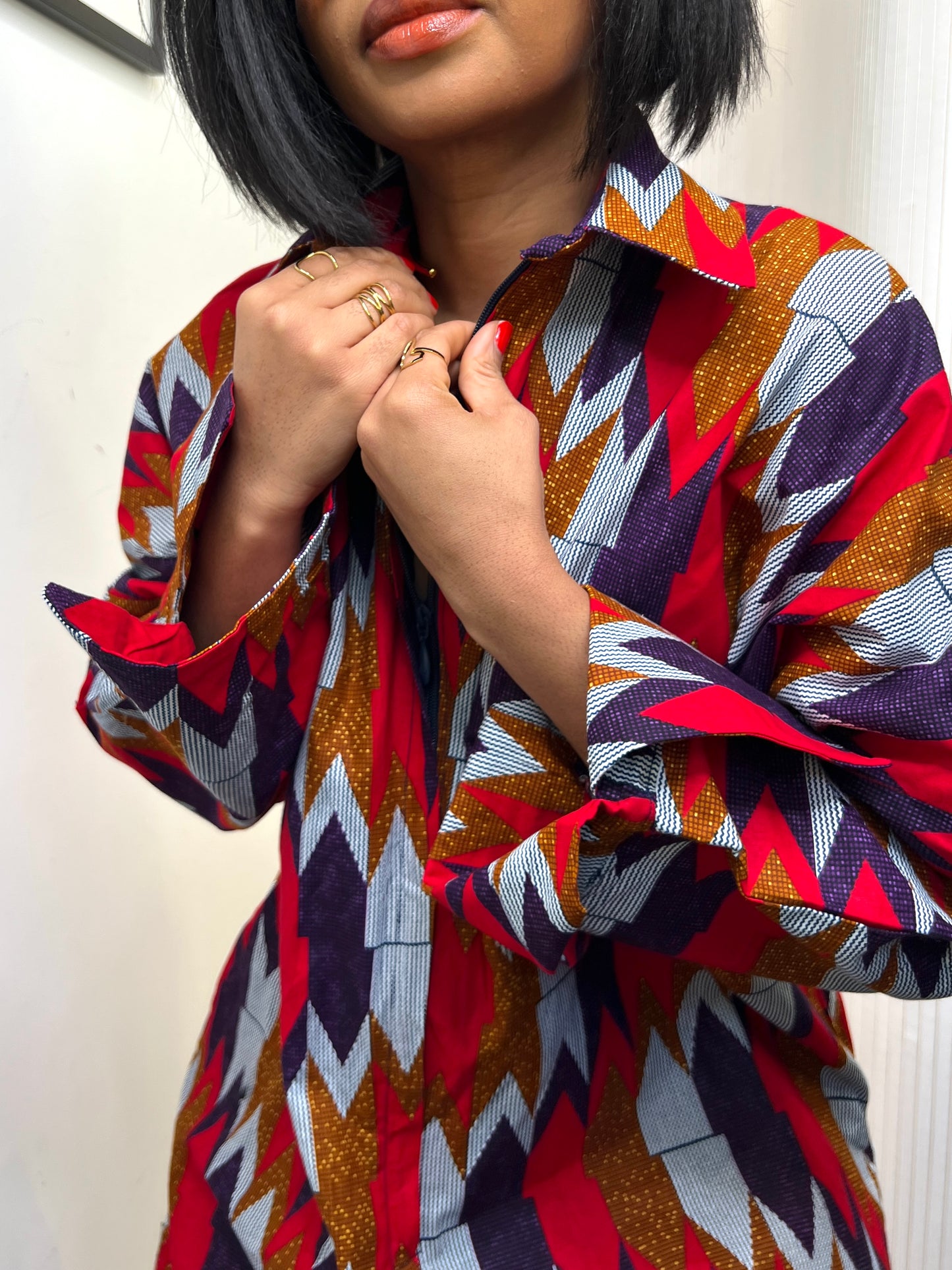 African print long sleeve jumpsuit. Red and navy kente UK size 1 8-14/16