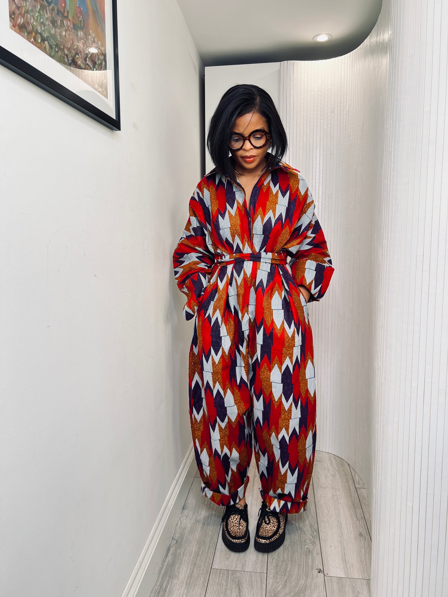 African print long sleeve jumpsuit. Red and navy kente UK size 1 8-14/16