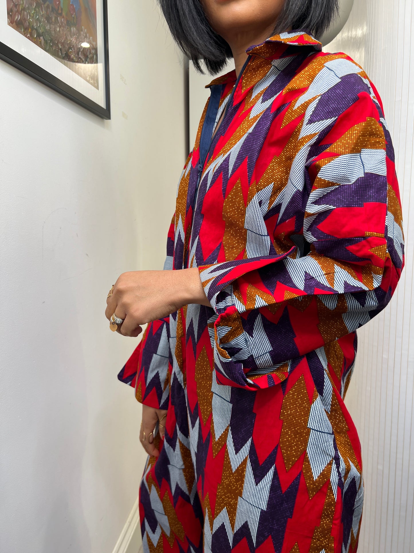 African print long sleeve jumpsuit. Red and navy kente UK size 1 8-14/16